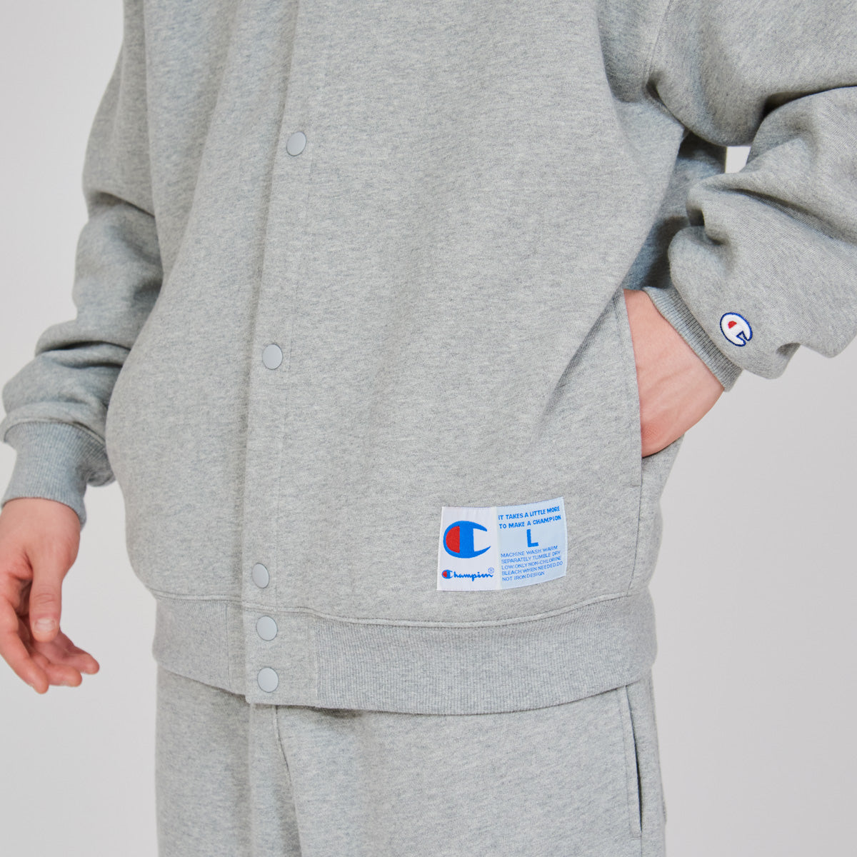 SNAP SWEATSHIRT